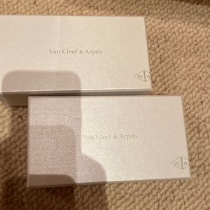 2 Van Cleef and Arpels boxes.